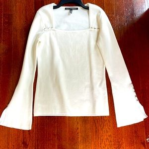 Creamy white cotton sweater with silver button detail and square neckline